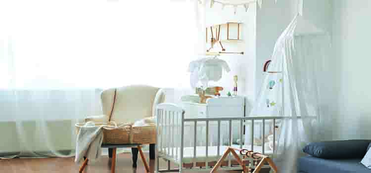Baby Chewing on Crib
