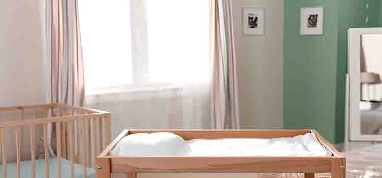 Convertible baby dresser that functions as a changing table